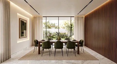 تصوّر تصميم غرفة طعام فيلا مودرن بطاولة مستطيلة وكراسي خضراء أمام الحديقة – تصميم فلل دبي – المشهد سكاي