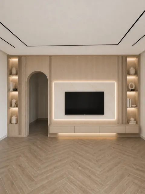 ديكور جدار رخام كريمي حول التلفزيون ورفوف مضاءة